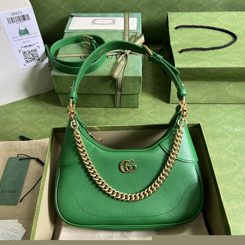G*u*i top handle bags